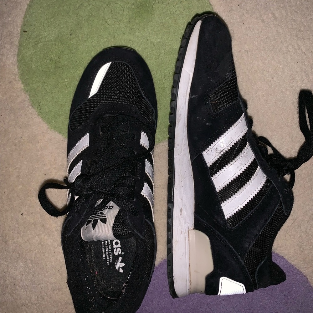 Black and white mens 7.5/women’s 9 adidas